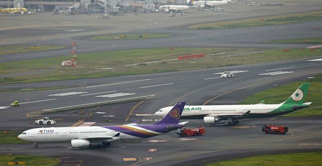 تصادم طائرتين في مطار "هانيدا" الياباني ..وتأجيل عدد من الرحلات الجوية